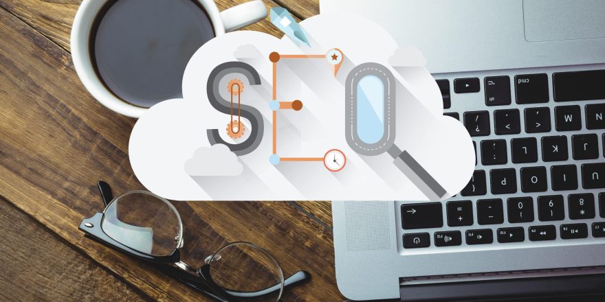digital composite of coffee with laptop and SEO graphics