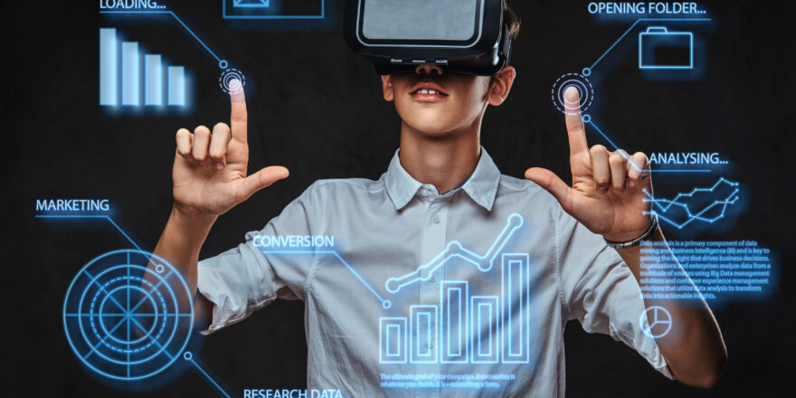 Teenager dressed in a white t-shirt using virtual reality glasses with graph charts, numbers, lines. Technology concept.