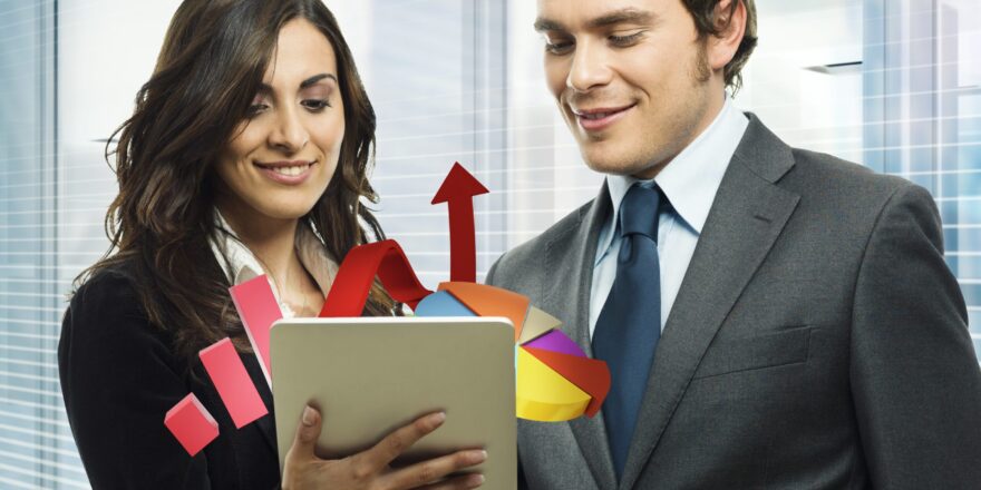 Business people analyze in a tablet graphics
